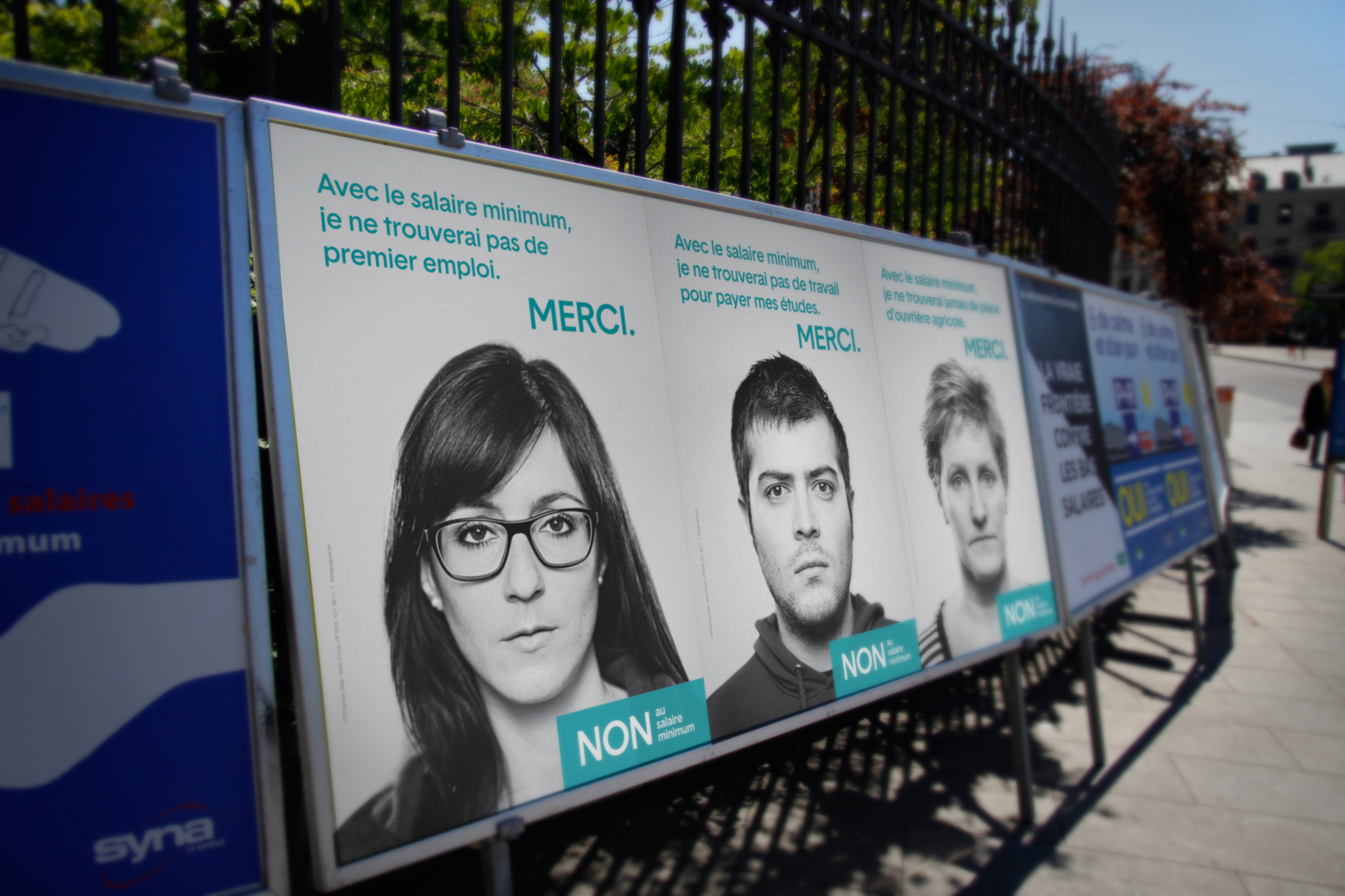 3 versions des affiches du Non au salaire minimum de la campagne politique par Enigma